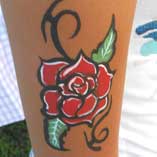 Rose Tat